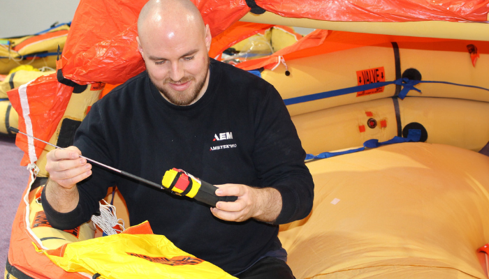 Technician working in  Life Raft